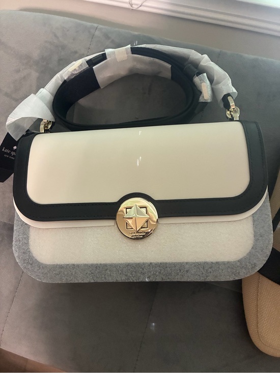kate spade Handbags - kate spade White and Black Crossbody with Gold Star Medallion